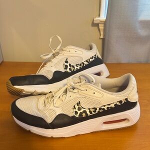 Nike White Cream Sneakers with Black and Leopard Swoosh
